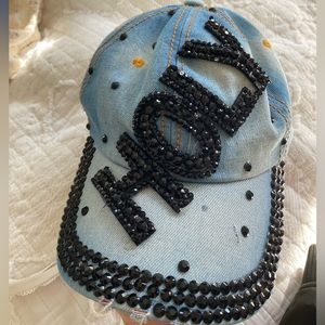 handmade, distressed, and adjustable bejeweled denim “holy” hat
